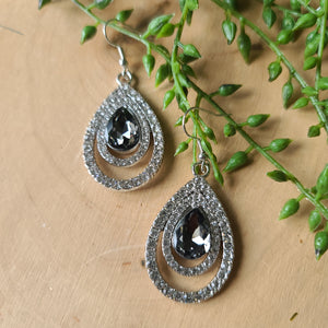 Paparazzi - So The Story GLOWS - Silver Earrings
