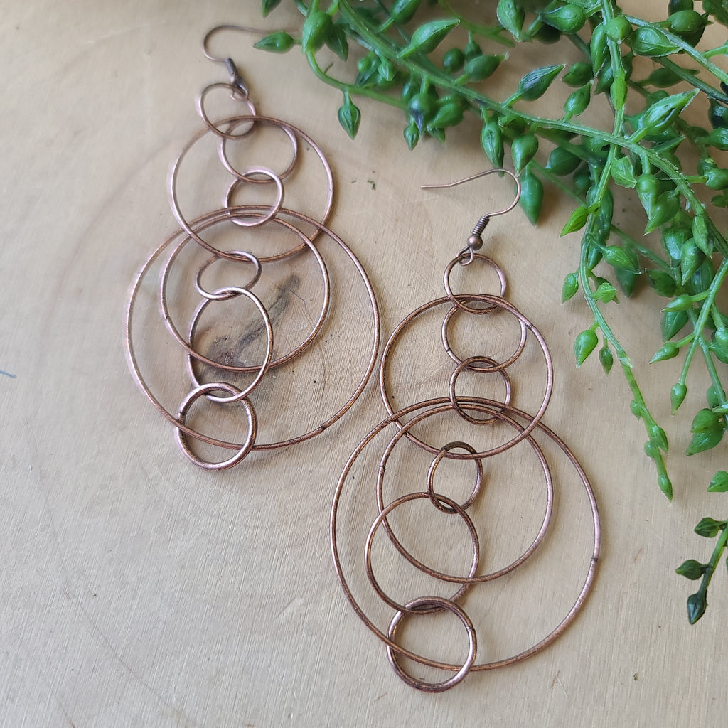 Paparazzi - Running Circles Around You - Copper Earrings