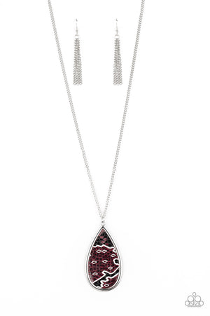 Paparazzi Jewelry. Necklace, Bracelet, Earrings, Rings Featuring a metallic scale print, a piece of purple leather embellishes the center of an oversized silver teardrop at the bottom of a lengthened silver chain for a wild look. Features an adjustable clasp closure.  Sold as one individual necklace. Includes one pair of matching earrings.  New Kit