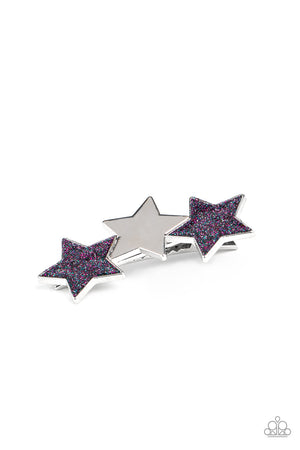 Paparazzi Jewelry. Necklace, Bracelet, Earrings, Rings Painted in glittery blue and purple sparkles, a sparkly pair of stars flanks a shiny silver star, coalescing into a stellar centerpiece. Features a standard hair clip.  Sold as one individual hair clip.  New Kit
